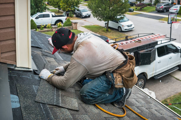 Professional Roofing technician working in Upper Darby, PA